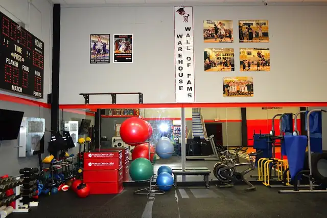 The training corner now: medicine balls, agility gear and the Warehouse Wall of Fame