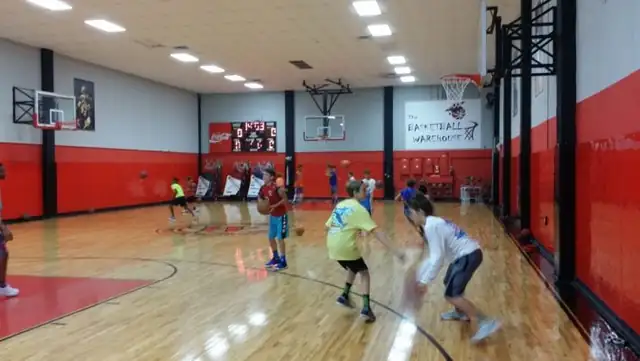 Players working through ball-handling drills on the Warehouse floor