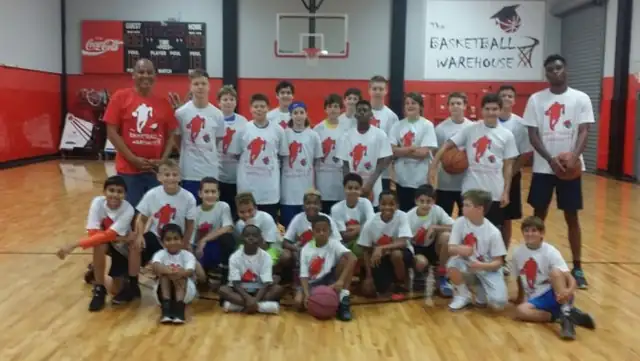 A 2016 camp group with their coach